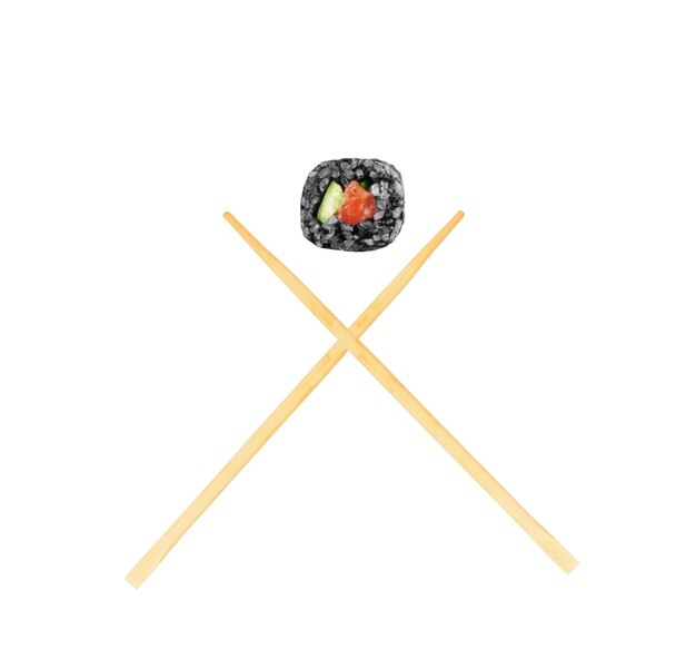 Isolated sushi roll with chopsticks