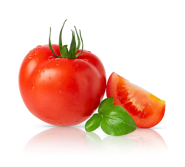 Isolated tomato with slice and basil on white background with clipping path