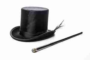 Photo isolated top hat and magic wand on white background