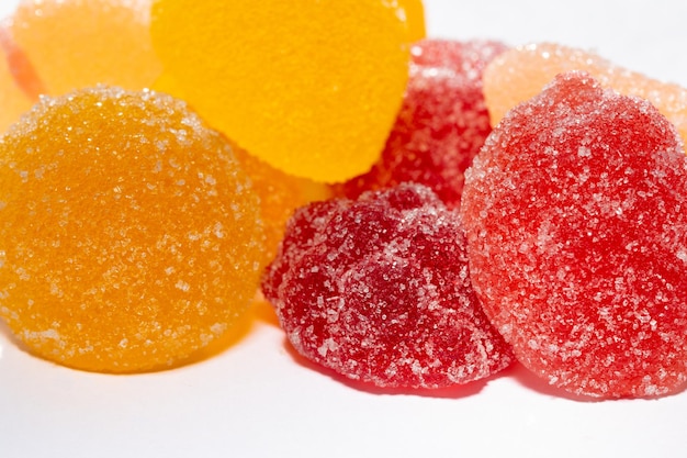 Isolated on white background red and yellow jelly sweets