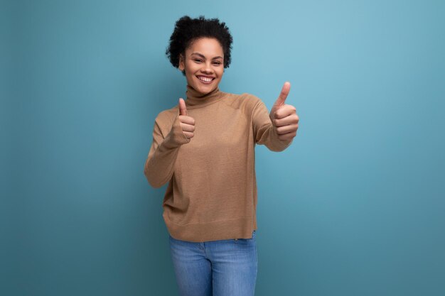 isolated with background smiling pretty young brunette hispanic woman with ponytail