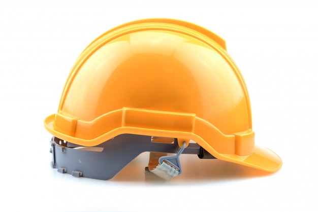 Casco giallo isolato per il costruttore