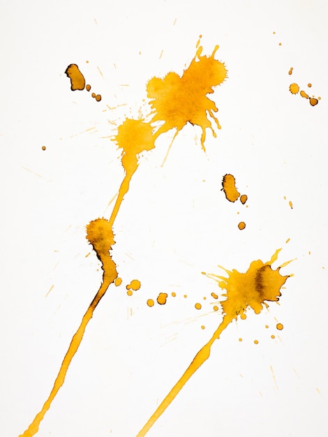 Isolated yellow splash on paper