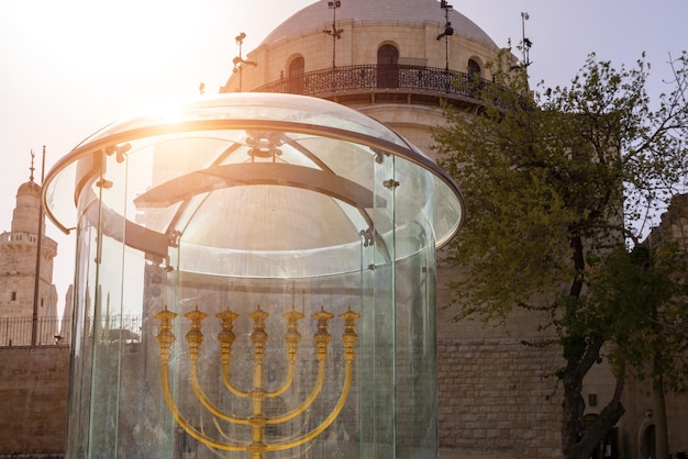 Israel Jerusalem golden menorah in Old City Jewish quarter near Western Wall and Dome of Rock