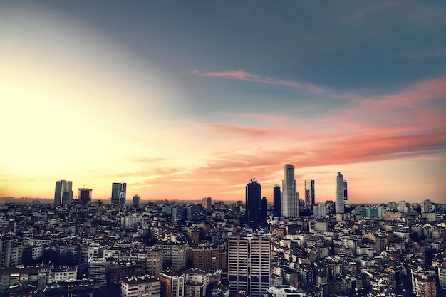 Istanbul cityscape against sky during sunset