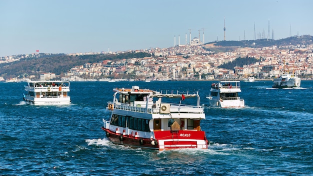 Istanbul Turkey 1 April 2017 Passenger ships crossing Bosporus at spring day