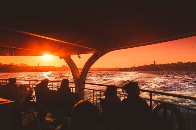 Istanbul Turkey March 03 2020 General view from people using public ferry for transport during sunset