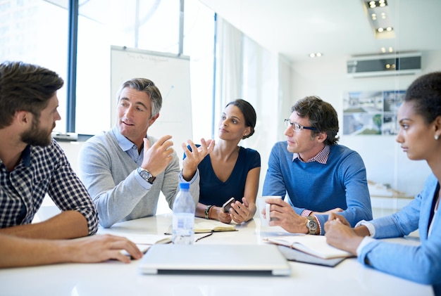 It all started with this great idea Shot of a group of businesspeople discussing work during a boardroom meeting