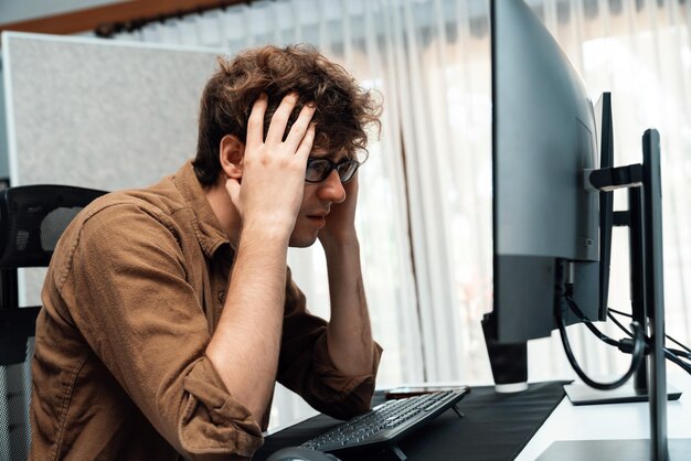 It developer with stressful overworked having headache in bad feeling gusher