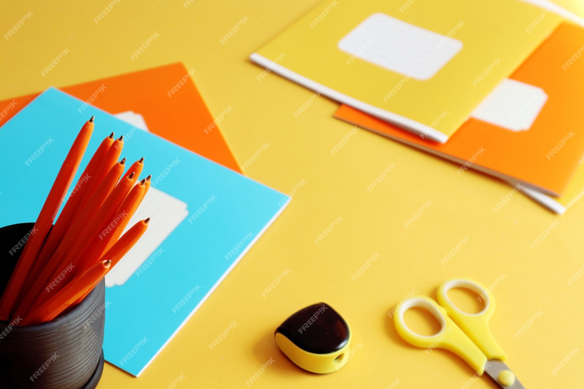 Premium Photo  Colorful cardboard and scissors closeup