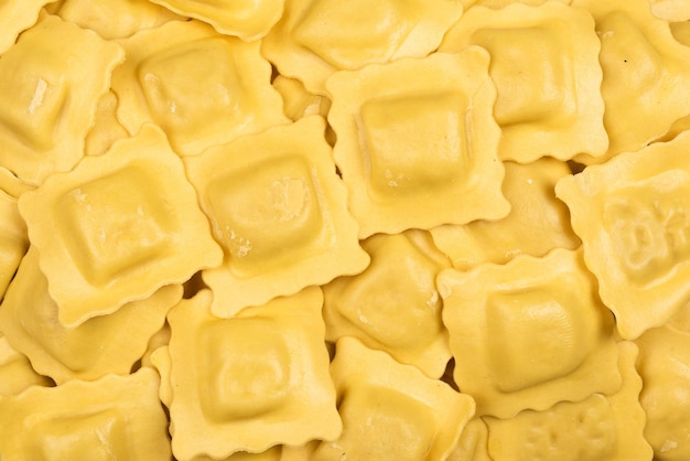 Italiaans eten geproefd Hoeveelheid ravioli pasta als achtergrond Bovenaanzicht stijl