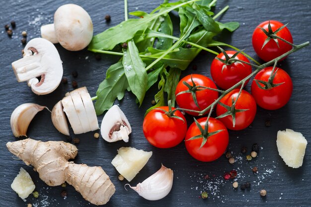 Italian background with mushrooms and tomatoes