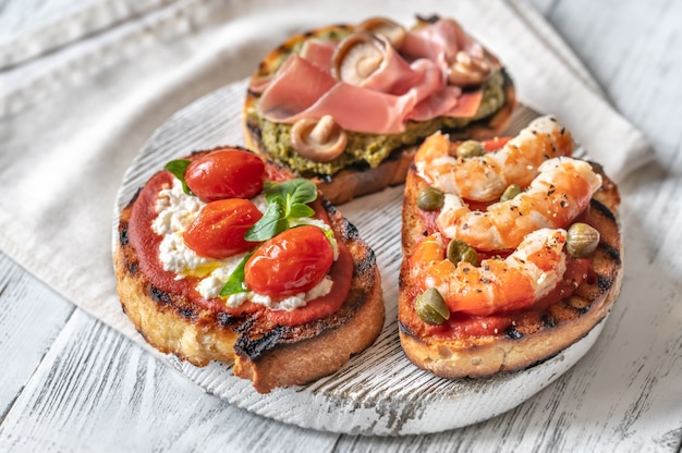 Italian buschettas with different toppings