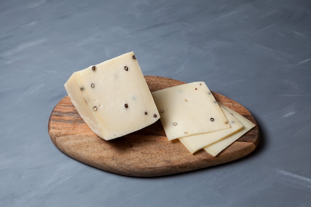 Italian Caciotta cheese with black pepper.