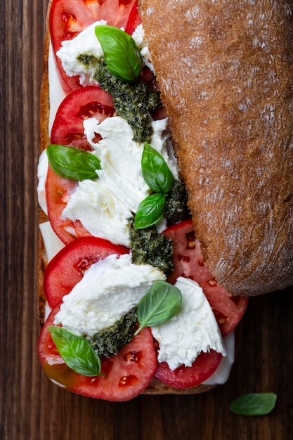 Italian ciabatta bread with mozzarella, tomatoes and basil