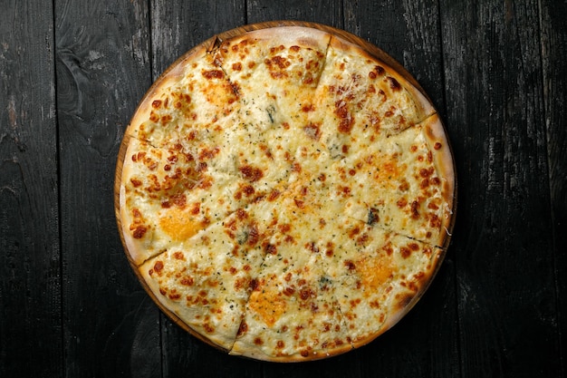 Italian cuisine Pizza on a black table