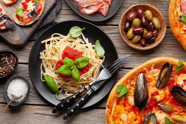 Italian cuisine Pizza pasta and toasts