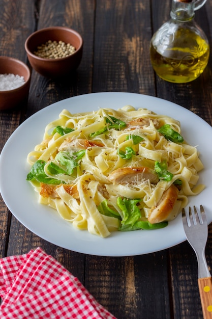 Italian fetuccini alfredo pasta with chicken. National cuisine. Healthy eating.