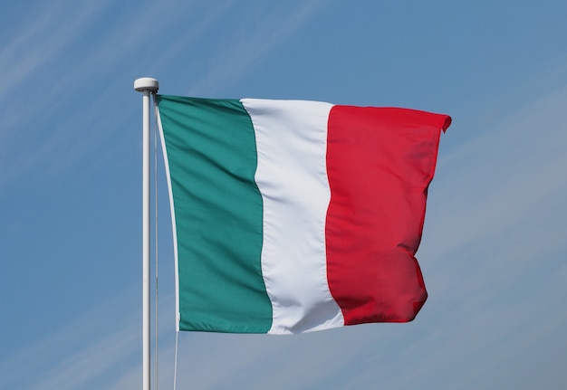 Italian Flag of Italy over blue sky