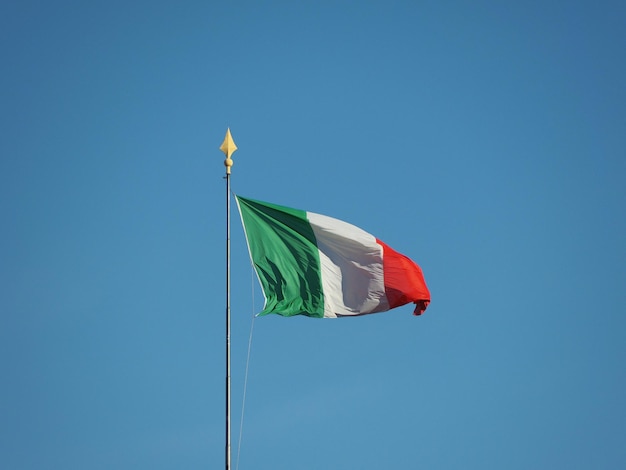 Italian Flag of Italy over blue sky