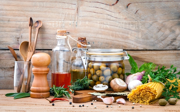 Photo italian food concept pasta with vegetables set up with wooden background.