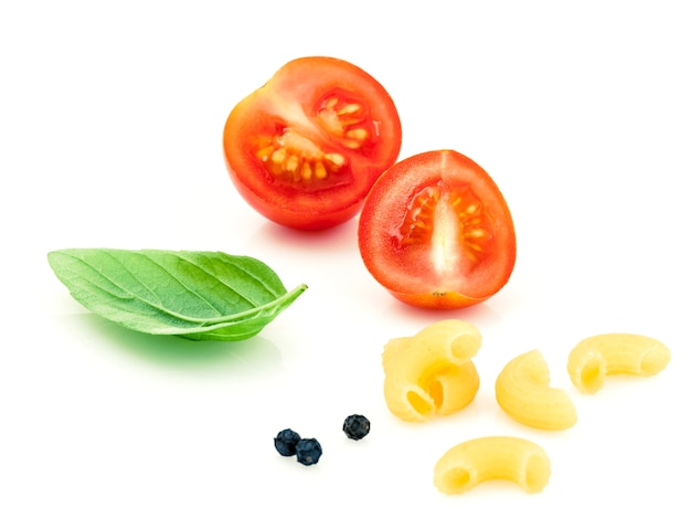 Italian food concept tomato and sweet basil isolate on white background .