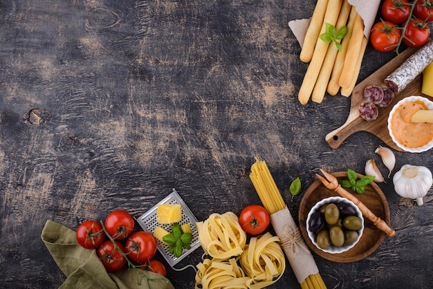 Italian food cooking background with pasta