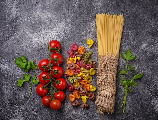 Italian food. Pasta, tomatoes and parsley