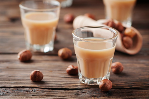 Italian hazelnut liqueur on the wooden table