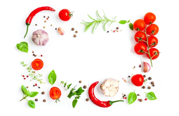 Italian herbs and spices as a frame with copy space on white background