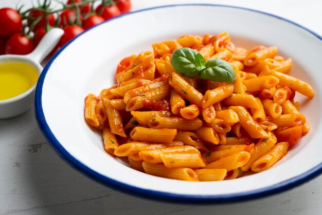 Italian macaroni with tomato and basil sauce