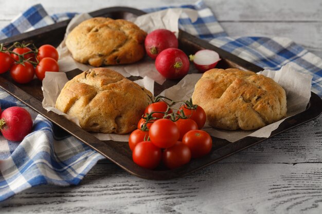 Italian olive bun with tomatos