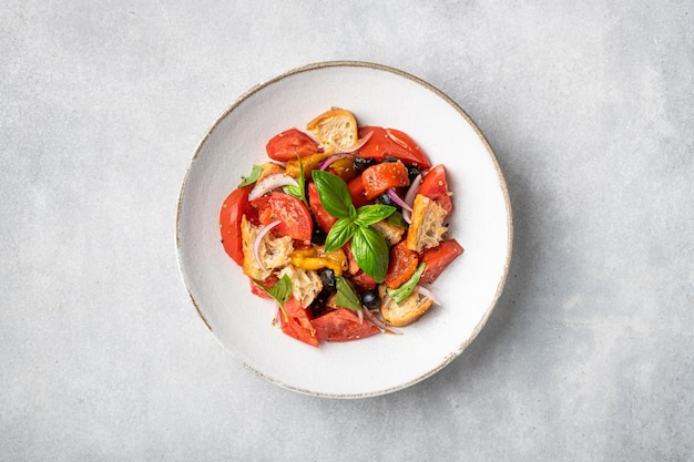 Italian panzanella salad with tomatoes and bread view from above