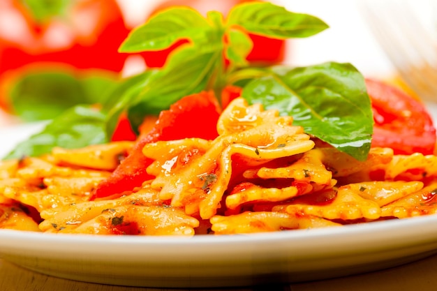 Italian pasta farfalle butterfly bowtie and tomato sauce