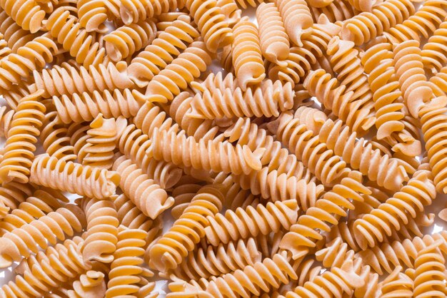 Foto pasta italiana, modello con texture di sfondo