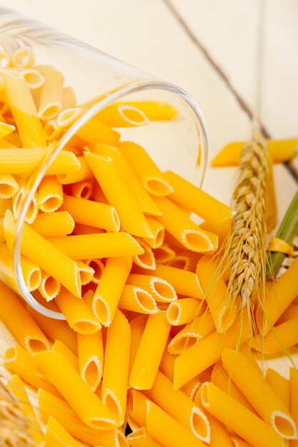 Photo italian pasta penne with wheat