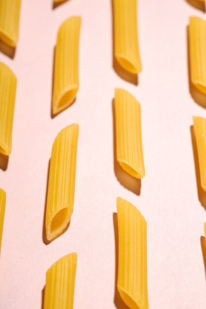 Italian pasta, raw penne tube macaroni pattern