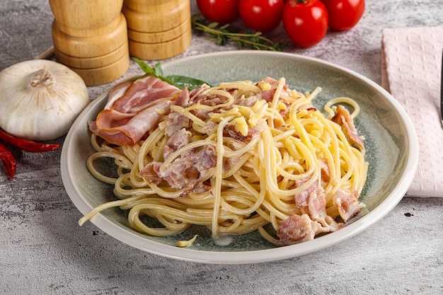 Italian pasta spaghetti Carbonara with bacon