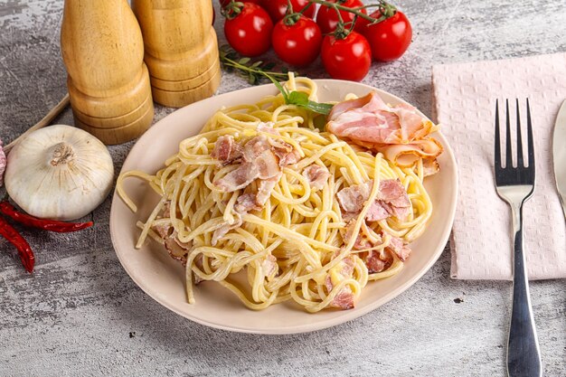 Italian pasta spaghetti Carbonara with bacon