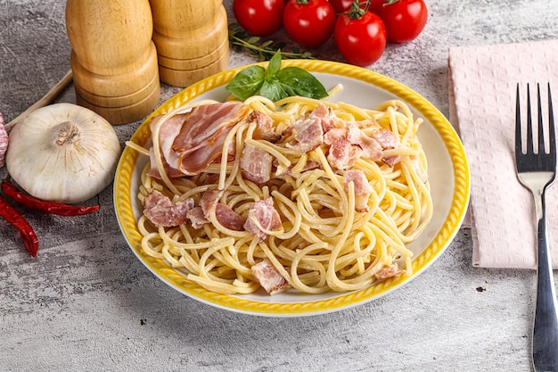 Italian pasta spaghetti Carbonara with bacon