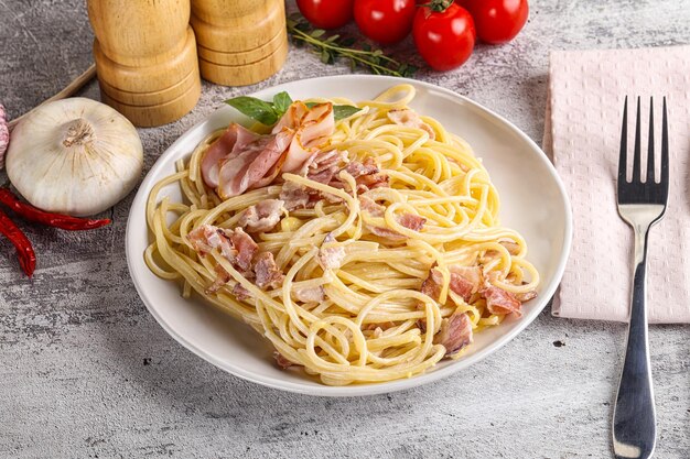 Italian pasta spaghetti Carbonara with bacon