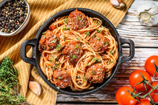 Italian pasta spaghetti with tomato sauce and meatballs