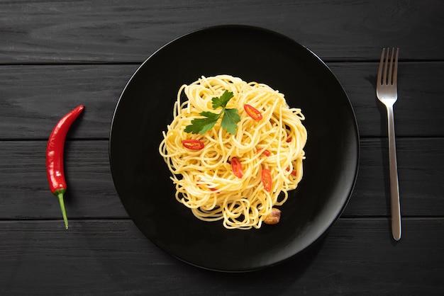 Italian pasta with chili peppers garlic olive and parsley