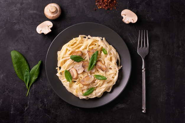 Italian pasta with creamy sauce and mushrooms