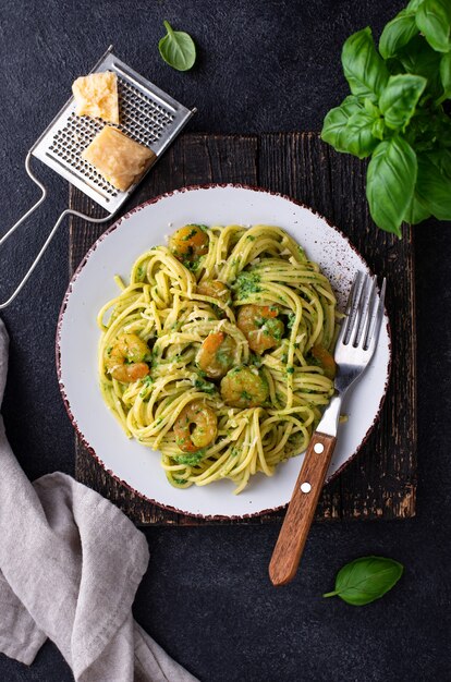 Italian pasta with spinach and shrimps