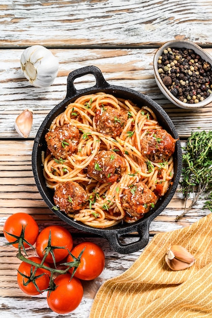 Italian pasta with tomato sauce and meatballs