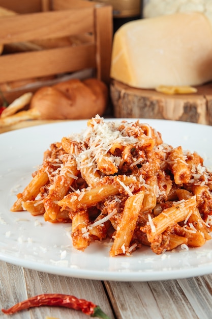 Italian penne pasta bolognese beef and parmesan