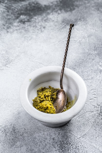 Italian  Pesto in marble mortar. 