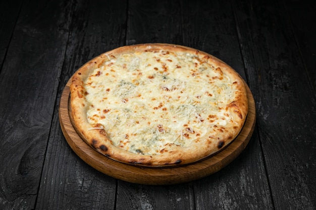 Italian pizza on a dark table