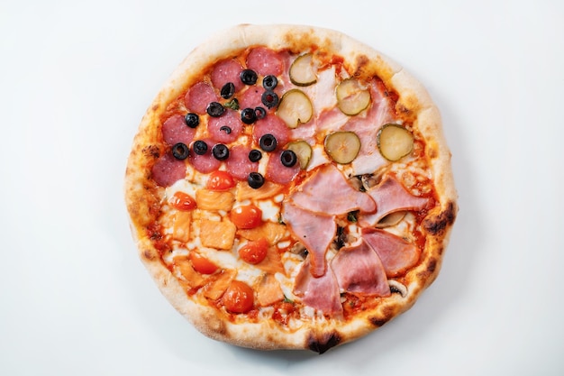 Italian pizza four seasons with ham cucumber olives and salmon Italian fast food delivery